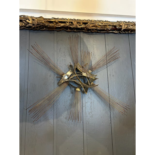 Large-scale vintage wall sculpture featuring a bold Brutalist composition with welded metal forms and radiating brass-...