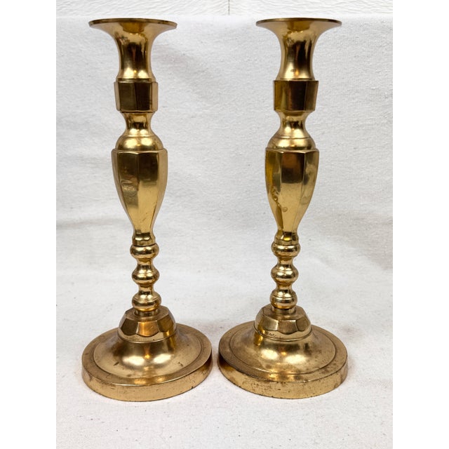 Vintage pair of brass candlesticks. Tall and perfect to make a statement on a mantle, table or buffet. Can use year round....