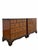 Offered here is a pair of Baker Furniture Milling Road dressers or bachelors chests. They are constructed of cherry wood...