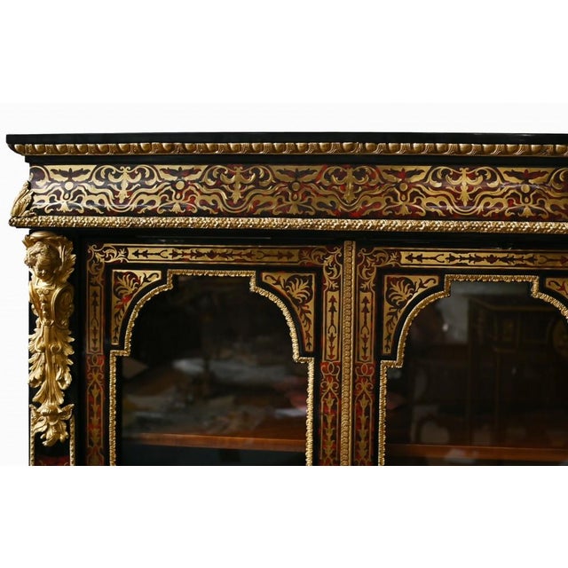 You are viewing a gorgeous French vitrine / display cabinet in the Boulle style Such an elegant look to this cabinet...