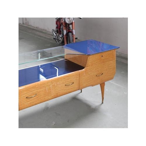 Type Sideboard blue sideboard Date 1950-59 Origin Italy Materials Wood, Glass Model Chest of drawers with glass...