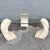 This postmodern coffee table balances sculptural stone with airy transparency. Three C-shaped tessellated stone supports...