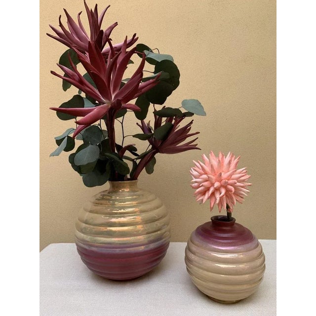 of the large spring vase, made and decorated by hand in majolica of Faenza, luster and purple mat. Dimensions: diameter 22...