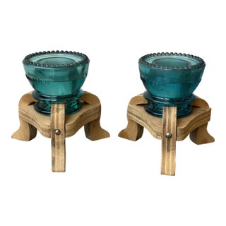 Vintage Make-Do Hemingray Glass Insulator Candleholders With Laminated Wood Bases, a Pair, Circa Mid 20th Century For Sale