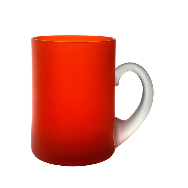 Like new orange satin glass Mid century mugs by Carlo Moretti . The satin finish is persimmon orange with colorless handles.