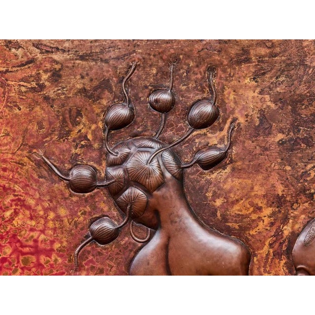 This unique artistic relief comes from Africa and is made using the traditional technique of pressing into a copper sheet,...