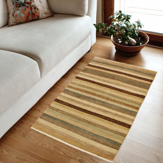 Enhance the ambiance of your home with this magnificent Persian-influenced Turkish hand-knotted rug made by skilled...