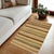 Enhance the ambiance of your home with this magnificent Persian-influenced Turkish hand-knotted rug made by skilled...