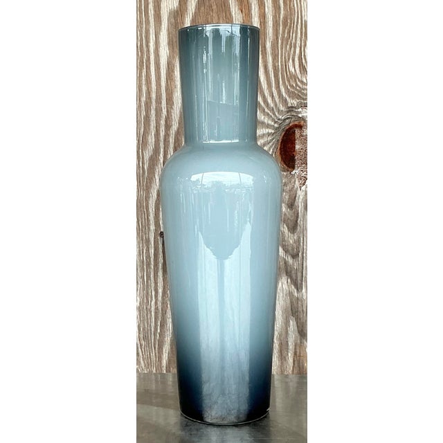 Introducing our Vintage Contemporary Art Glass Ombre Tall Vase. This striking vase features a captivating ombre design,...
