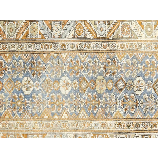 This Antique Persian Melayer Runner is a stunning addition to any room. With its intricate designs and warm colors, it...