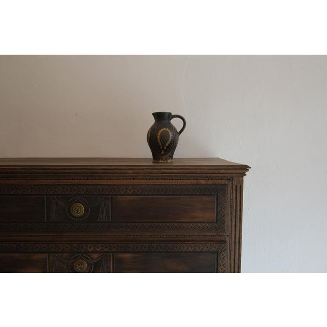 German stoneware jug with brown salt glaze and floral pattern. Probably early 20th century. Dimensions: Height: 28 cm /...