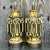 Add a touch of classic American style to your home with this pair of Vintage MCM Glazed Ceramic Lamps. Exemplifying the...