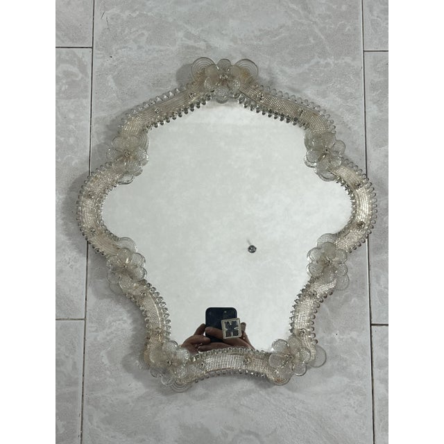Mid-Century Murano glass wall mirror, 1960s. Intact and in good condition, small signs of aging. Attribution mark...
