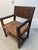 Antique Italian 18th Century carved leather arm chair in renaissance style.