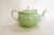 Small antique teapot, rounded and bulbous body, openwork handle, small flared neck for the lid, with a pretty, ornate knob...