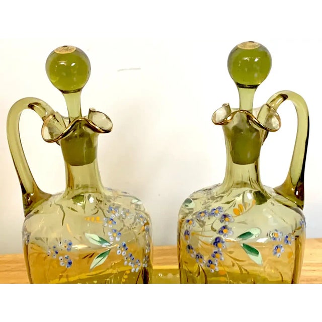 Moser Aesthetic enameled Cordial/ liquor set,15-pieces. Subtle olive green glass, with naturalistic enamel work with gilt...