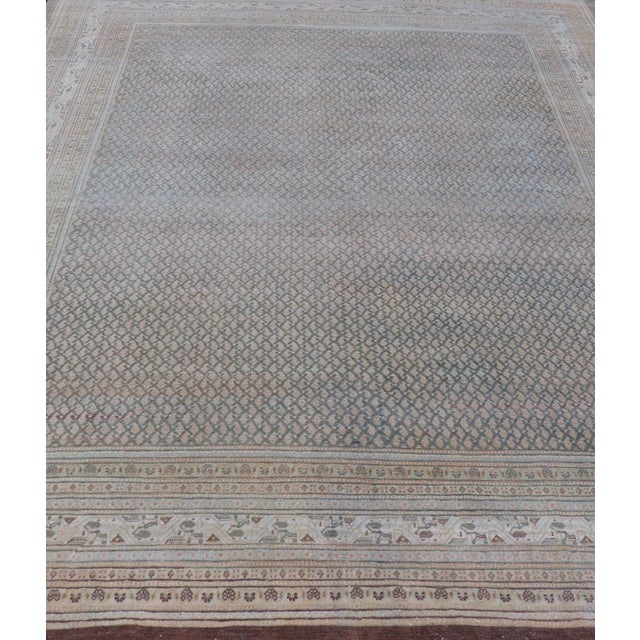 Antique Persian Tabriz Rug with all over small scale design in brown, gray and light blue. Keivan Woven Arts / rug...