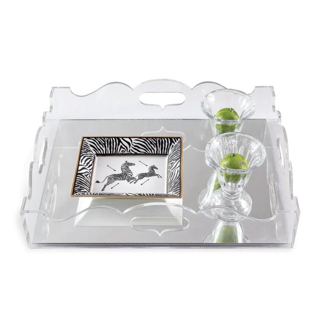 Gracious and dramatic. The queen anne tray is the perfect serving tray for cocktails or nibbles. The mirrored bottom...
