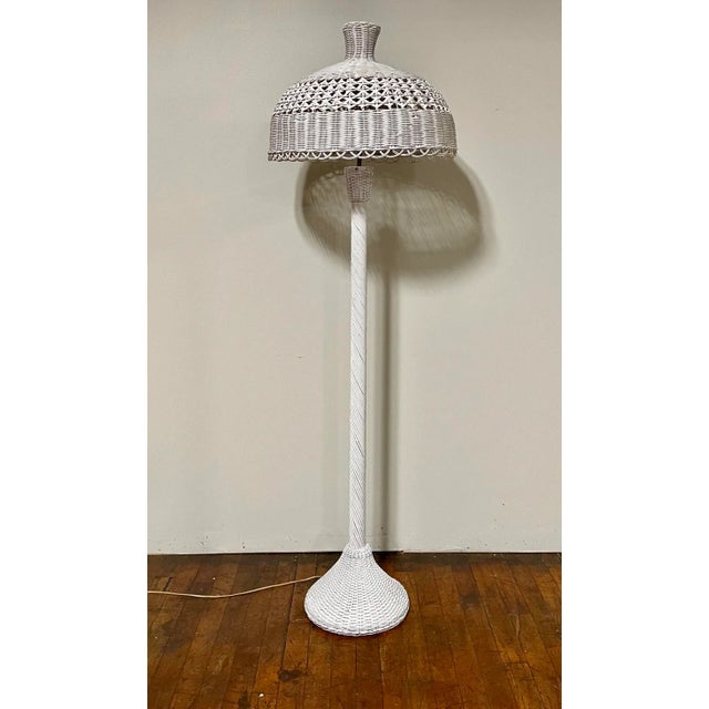 Incredible tall woven wicker boho chic floor lamp. Sure to make an impact in any setting.
