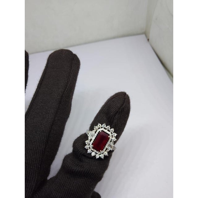Gemstone details Gold Purity: 18K Solid Gold Ruby: 1.57 cts Diamond: 0.79 cts 18K gold Gross weight: 3.76 grams Net...