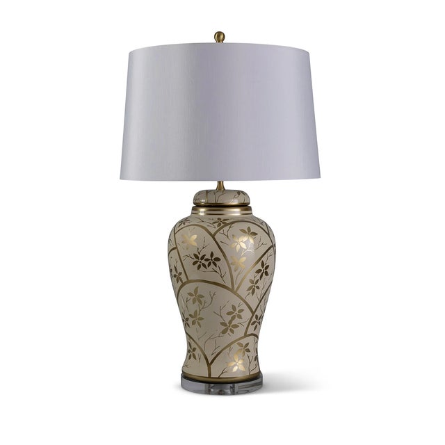 Gilded Arbor is a hand painted and lacquer collection of jar and lighting that depicts a golden spring. Blooming flowers...