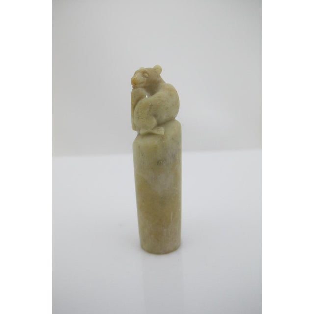 Small hand carved Chinese soapstone seal or chop featuring a small animal perched at top. I am unsure as to what the...