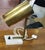 Vintage gold-coloured/brass cylinder lamp desk lamp. Beautifully sleek design. Minimalist desk lamp with brass head and...