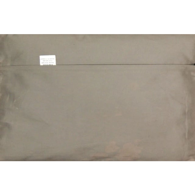 This pillow is made with a vintage handwoven Turkish hemp rug fragment. It has a cotton back and a zipper closure. Please...