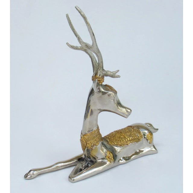 C.1970's; Asian, Thai Polished nickel combo, with gilt gold embellished details is this decorative reindeer with tall...