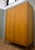 A stylish mid-century double wardrobe by McIntosh Furniture, dating from the 1960s. Crafted in beautifully figured teak...