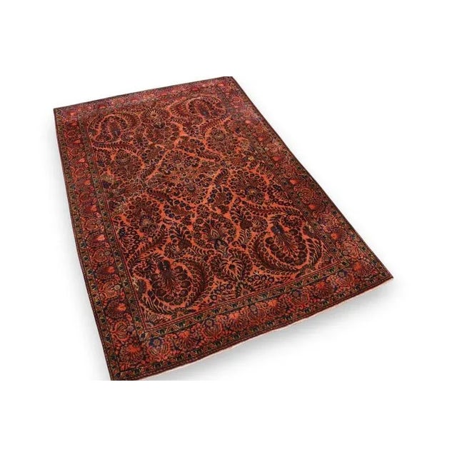 Antique Sarouk rug | Knot density: High | Pattern: Colorful leaf and floral motifs | Size: 202×131 cm | Material: High-...