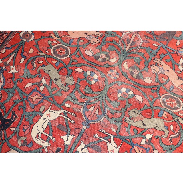 Room-size Persian Mahal rug with a Pictorial Animal all-over Pattern from the 1st quarter of the 20th century Measures:...
