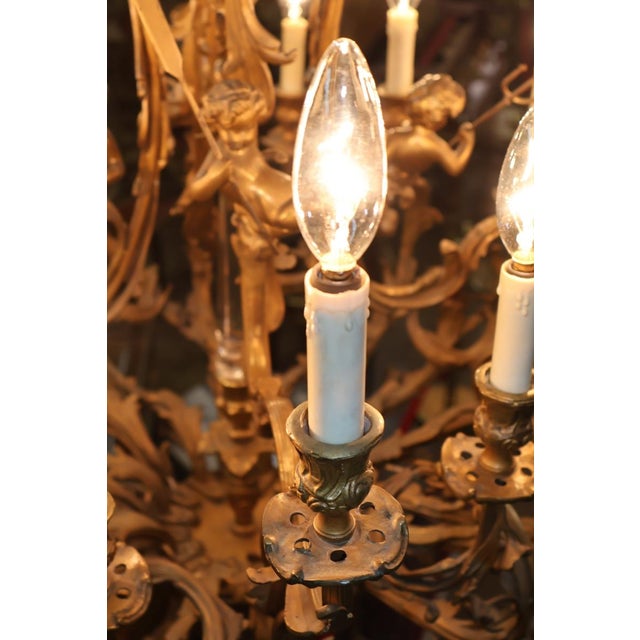 Early 20th Century French Rococo Style Gilt Bronze Putti 16 Light Chandelier For Sale - Image 10 of 18