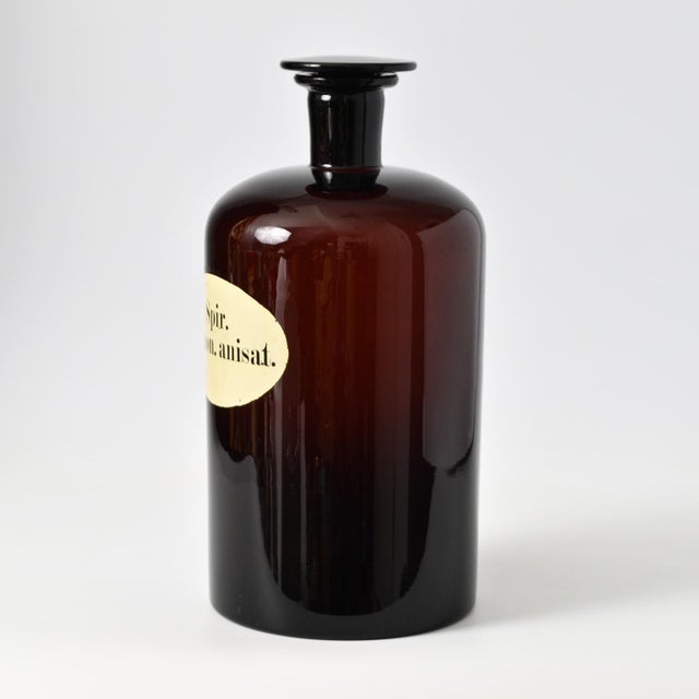 Large, hand made, brown glass apothecary bottle.