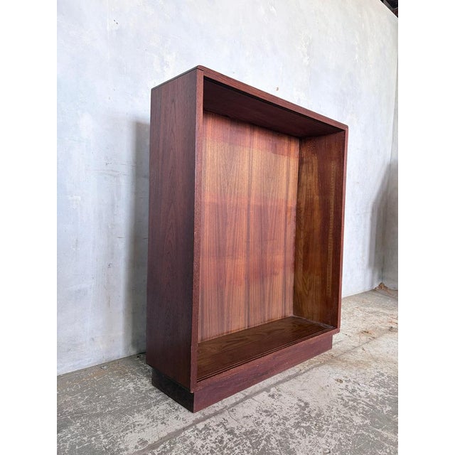 A really lovely mid century teak open cabinet with loads of character and a great, easy-to-style shape. This is one of...