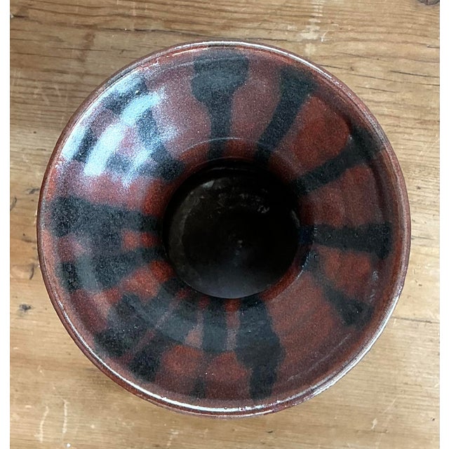 Hand-thrown by artist P. Myers in 2003, this striking studio pottery vase is a sophisticated study in contrasting textures...
