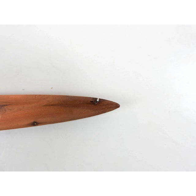 Hand carved wood letter opener. Soft honey color wood with nice pattern. Very smooth, some wear, tiny knot flaw near tip.