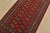 A tribal Bokhara rug hand-knotted with fine wool on a cotton foundation. This rug features rows of repeating medallions...