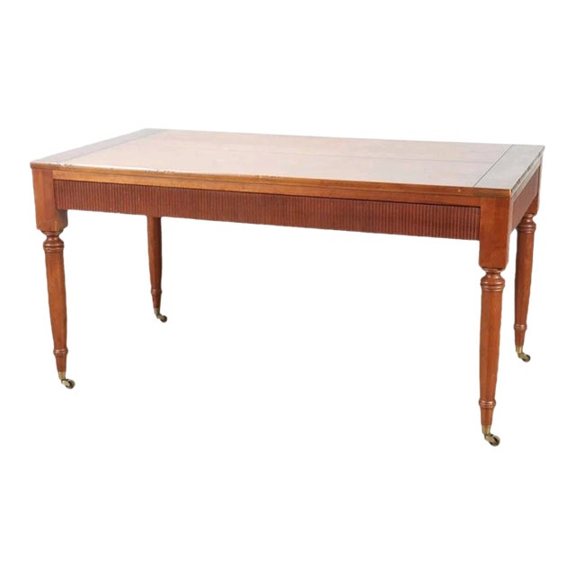 Late 20th Century Baker Milling Road Distressed Teak Writing Desk on Casters For Sale