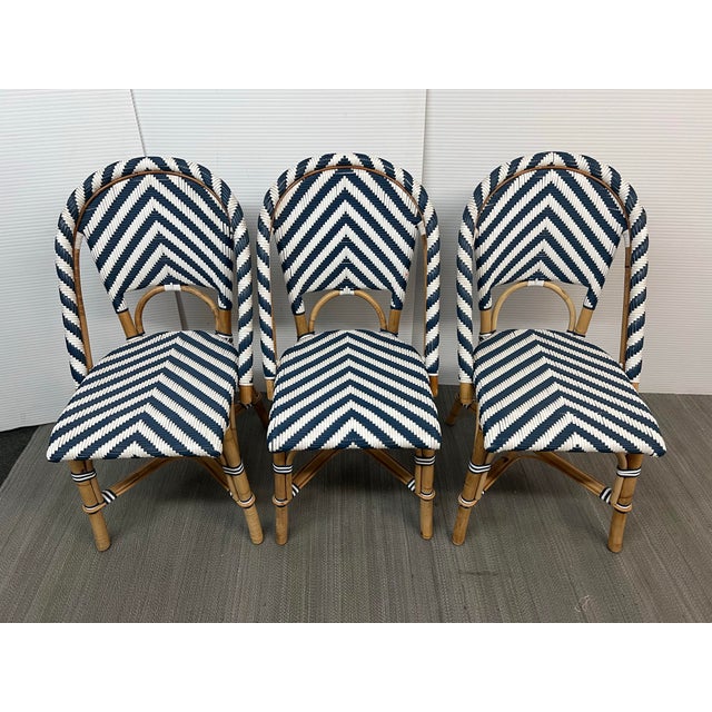 Design Plus Gallery presents a Set of Three Riviera Bistro Chairs from Serena & Lily. These classes bistro chairs are...
