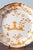 Diameter: 25 cm Height: 3 cm Some glaze losses to the edge. Marked underneath.