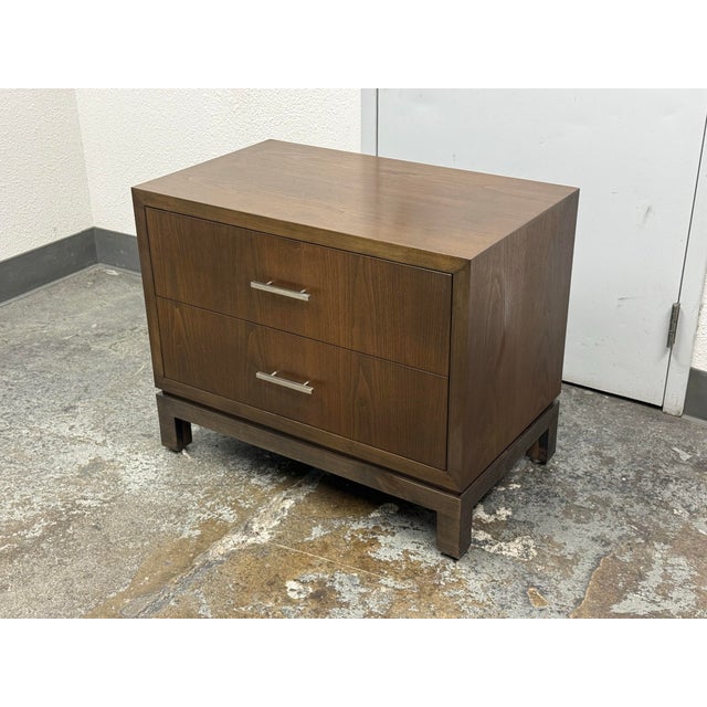 Design Plus Gallery presents a Contemporary Nightstand by Traylor & Co. The case piece shows a rectilinear silhouette in a...