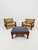 Mid century armchairs Set with coffe table in leather and wood By Carl Straub Germany, 1960s The beautiful armchair is...