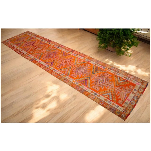 Offered is an one of a kind Kurdish runner rug, made in Hakkari approximately 50-60 years ago. The beautiful wool on wool...