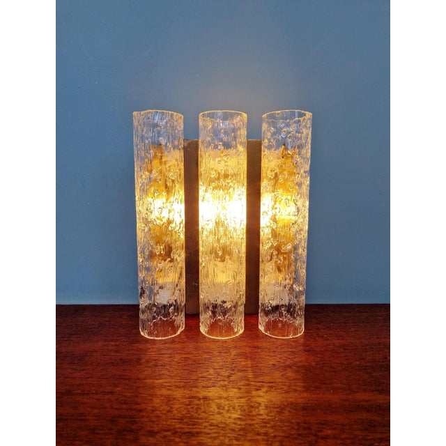 Wall sconce in brass and frosted tubular glass, produced by the german manufacturer doria, 1960s-70s. compatible with two...
