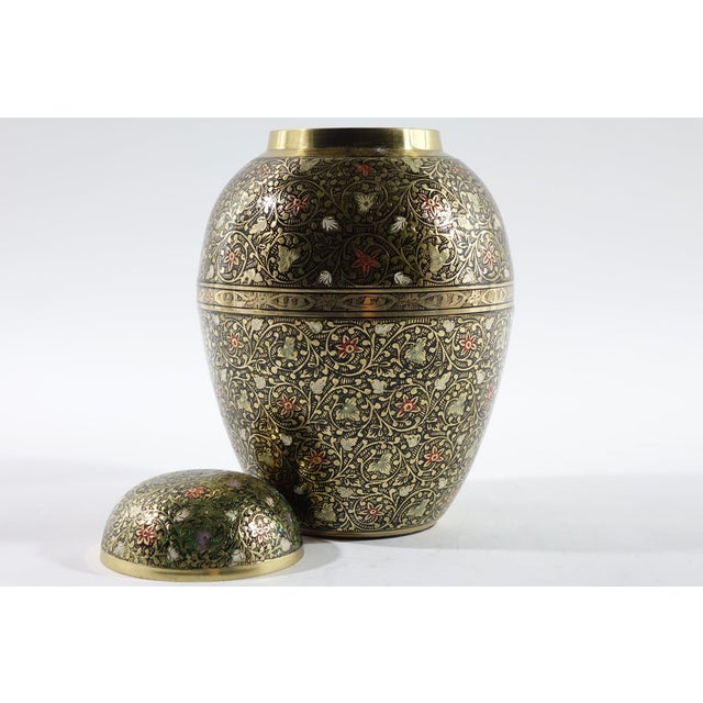 A Pair of Beautiful Decorative Brass Urns - 7” x 7” x 10” This exquisite pair of decorative brass urns showcases intricate...