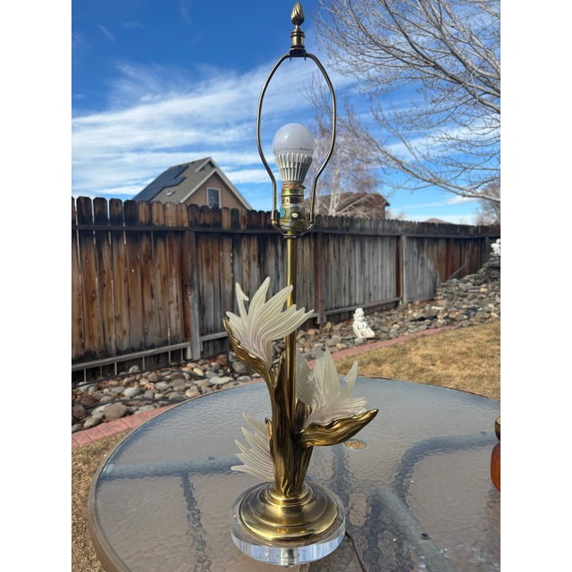 Gorgeous Stiffel Lamp with brass and lucite base and flowers. This lamp is very heavy and well made with the makers mark...