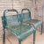 perforated metal garden chairs aged and weathered to perfection with a green paint.. overall height is 23" x 14" wide. the...