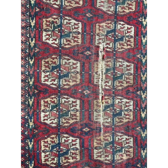 Beautiful antique Turkmen Bokhara distressed rug with nice geometrical and tribal design of Bokhara rugs, and nice natural...