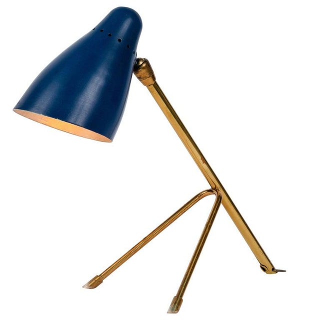 1950s Giuseppe Ostuni wall or ceiling lamp for O-Luce . Executed in blue painted aluminum and brass. The shade sits on a...